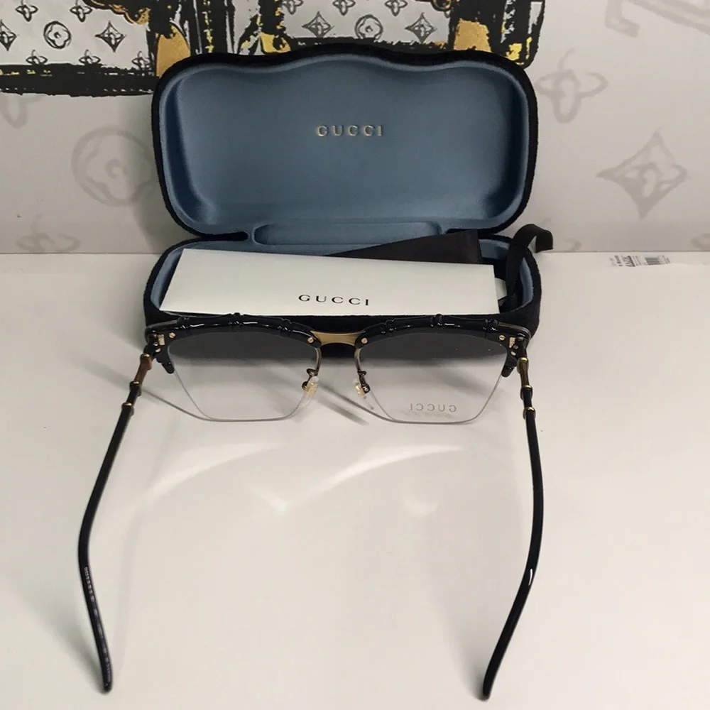 New Authentic Gucci Black and Brown Eyeglasses GG0660o 001